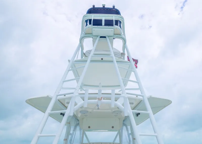 Slide: The Image of 2011 Yellowfin 42 Offshore boat tower against cloudy sky. - 17