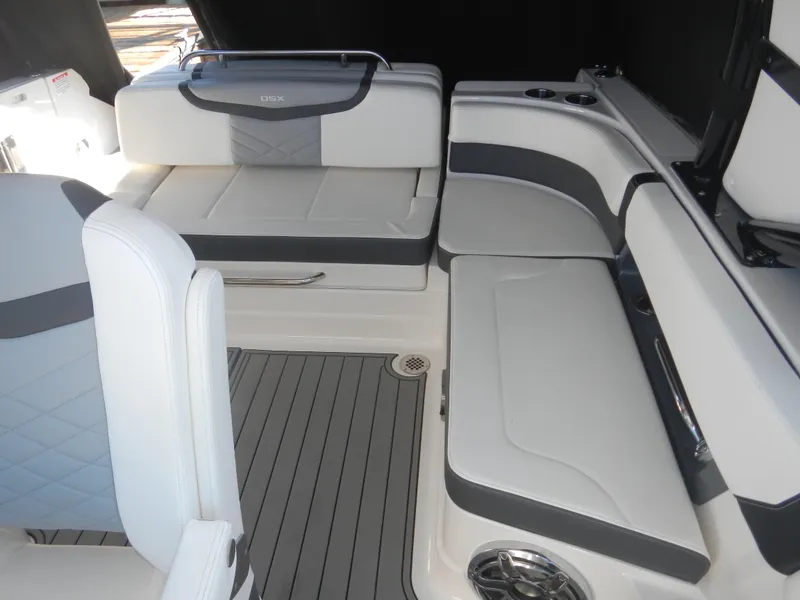 Slide: The Image of 2023 Chaparral 280 OSX boat interior with sleek seating and modern design. - 10
