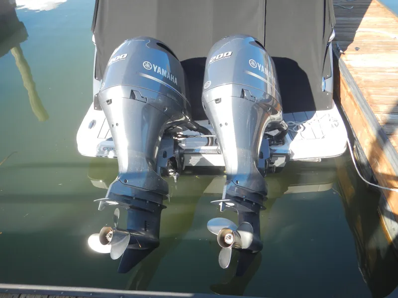 Slide: The Image of Twin Yamaha outboard engines on a 2023 Chaparral 280 OSX boat. - 4