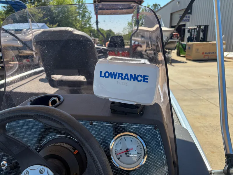 Slide: The Image of 2020 Bass Tracker Classic boat dashboard with Lowrance GPS and RPM gauge. - 8