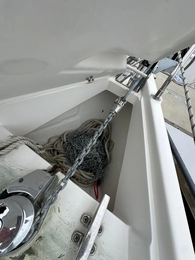 Slide: The Image of Anchor chain and rope on 2007 Hunter 44 Deck Salon sailboat. - 17