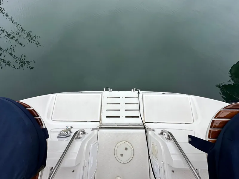 Slide: The Image of Hunter 44 Deck Salon 2007 yacht stern view with swim platform and railing. - 24