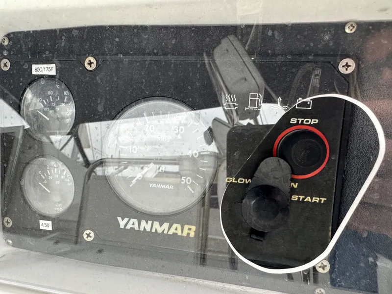 Slide: The Image of Control panel of a 2007 Hunter 44 Deck Salon with Yanmar engine gauges. - 33