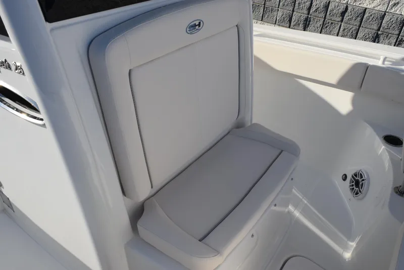 Slide: The Image of 2025 Sea Hunt Gamefish 25 boat seat, white upholstery, sleek design. - 12