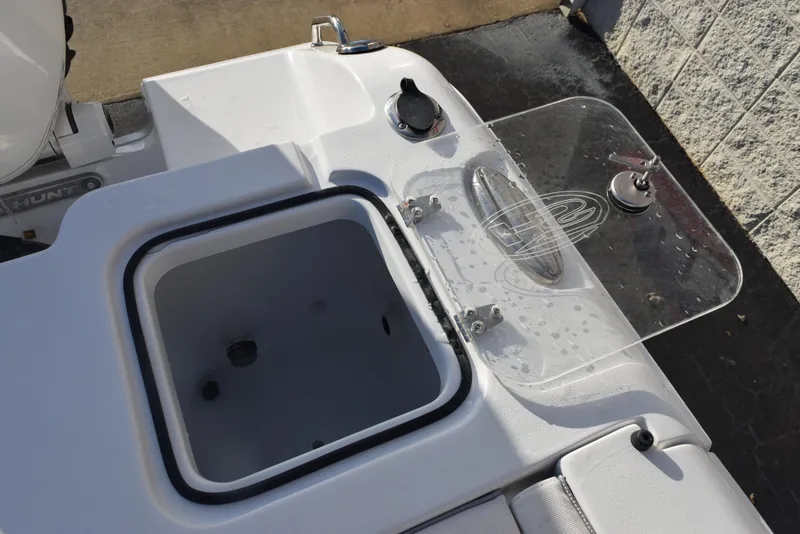 Slide: The Image of 2025 Sea Hunt Gamefish 25 boat livewell and storage compartment detail. - 17