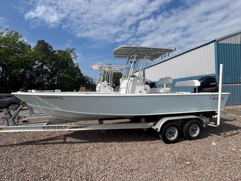 Slide: The Image of 2018 Cast & Blast 22 Kings Bay boat on trailer, parked outdoors. - 2
