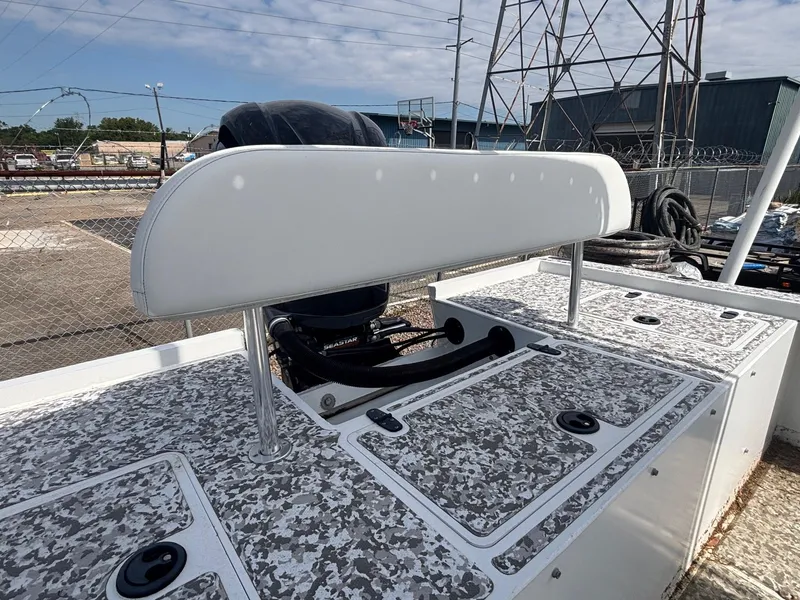 Slide: The Image of 2018 Cast & Blast 22 Kings Bay boat with patterned deck and white seating. - 5