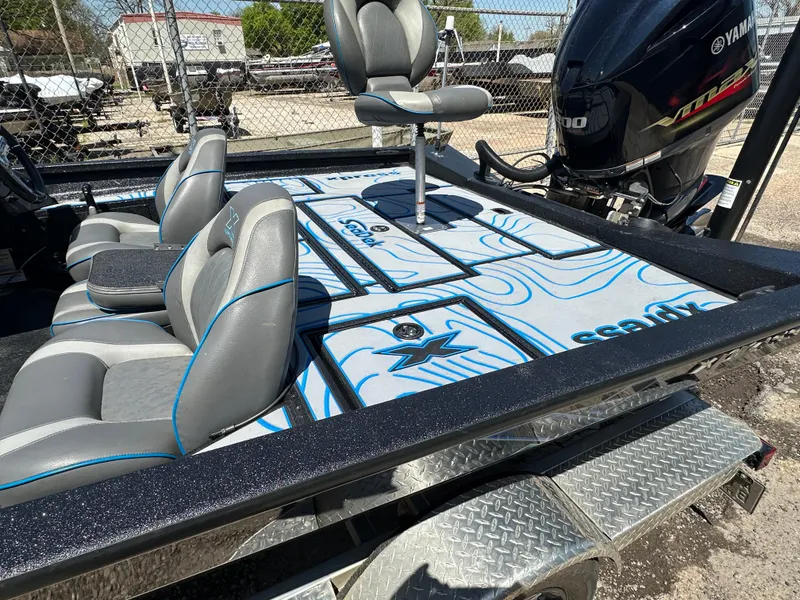 Slide: The Image of Xpress X19 Pro 2021 boat with Yamaha motor, featuring sleek seating and deck design. - 10