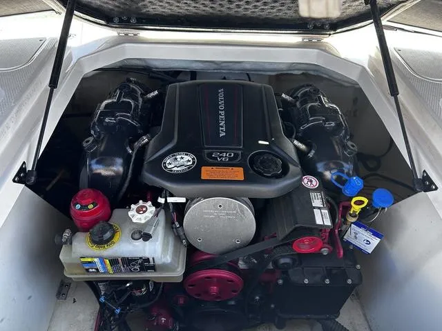 Slide: The Image of Engine compartment of a 2020 Chaparral 21 Surf boat with Volvo Penta V6 engine. - 13