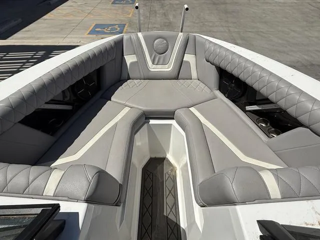 Slide: The Image of Luxurious interior of 2021 Tigé ZX Class 23 ZX boat with gray seating. - 10