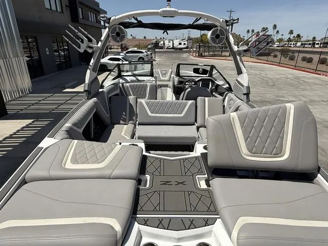 Slide: The Image of 2021 Tigé ZX Class 23 ZX boat interior with luxurious seating and modern design. - 11