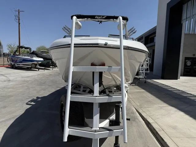 Slide: The Image of 2021 Tigé ZX Class 23 ZX boat on trailer, parked outdoors. - 3