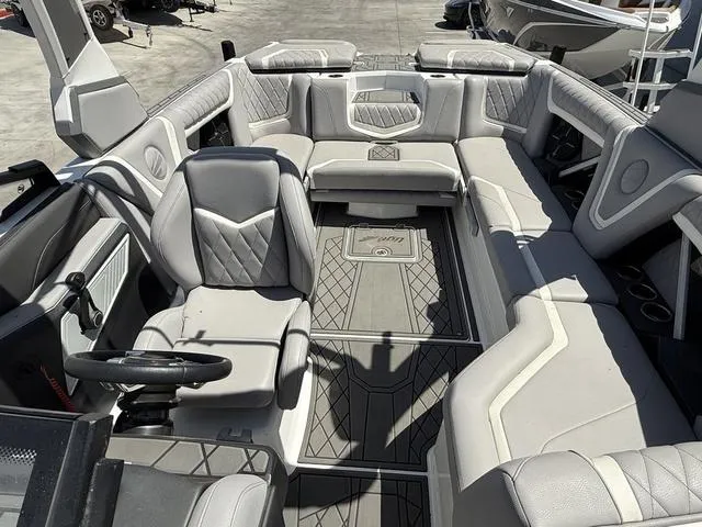 Slide: The Image of 2021 Tigé ZX Class 23 ZX boat interior with luxurious seating and modern design. - 8