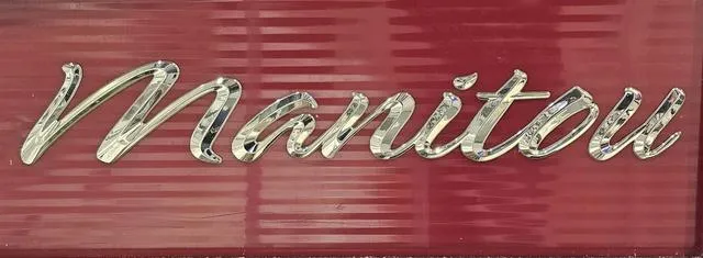 Slide: The Image of "Manitou" logo on red background, 2017 Aurora 25 LE model. - 37