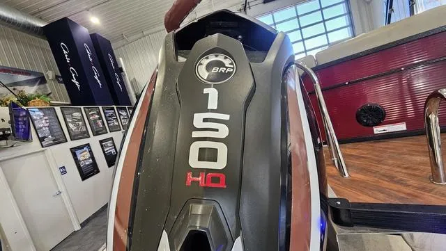 Slide: The Image of 2017 Manitou Aurora 25 LE with BRP 150 HP engine in showroom. - 39