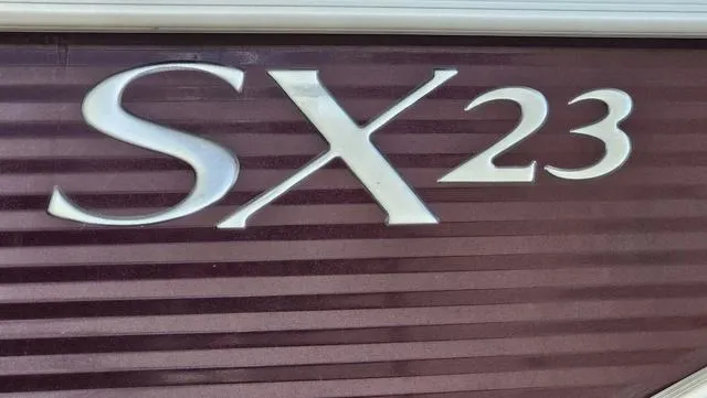 Slide: The Image of 2020 Bennington SX 23 Premium logo on maroon background. - 30