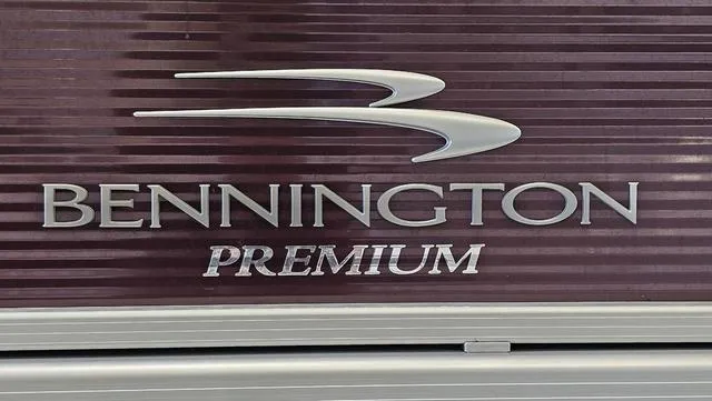 Slide: The Image of 2020 Bennington SX 23 Premium logo on a textured surface. - 31