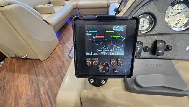 Slide: The Image of Control panel of a 2017 Manitou Aurora 25 LE pontoon boat with digital display. - 20