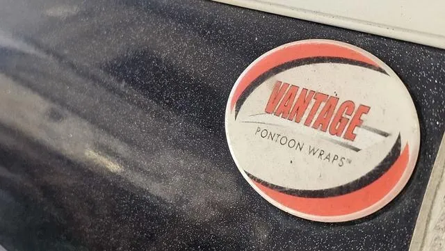 Slide: The Image of Sticker on 2020 Bennington SX 23 Premium with "Vantage Pontoon Wraps" logo. - 32