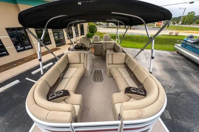 Slide: The Image of 2014 Bennington 2550 RBR pontoon boat with spacious seating and canopy. - 11