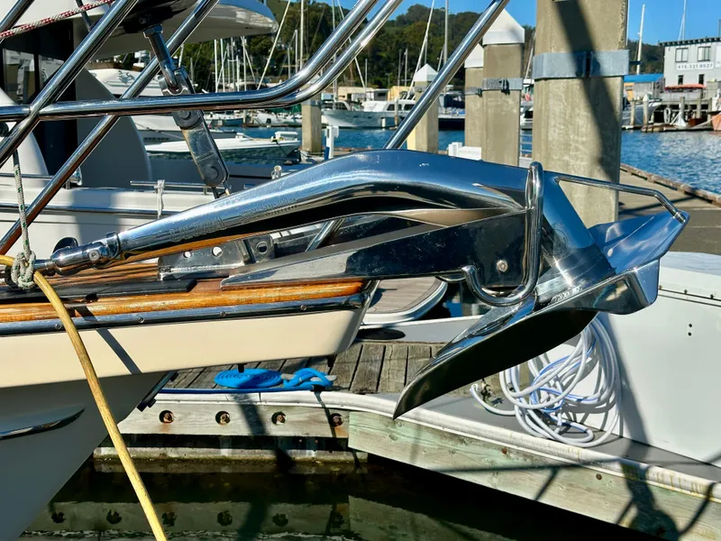 Slide: The Image of 2006 Island Packet 485 Center Cockpit yacht anchor at marina dock. - 10