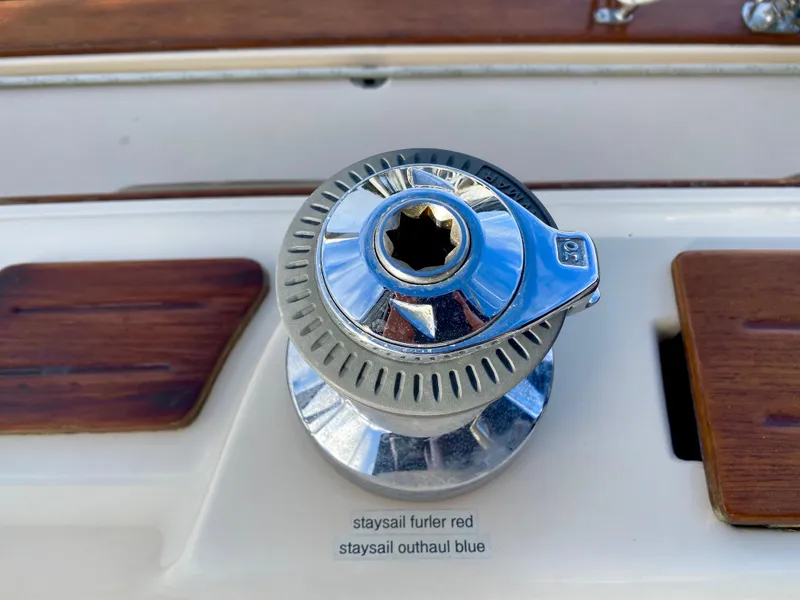 Slide: The Image of Winch on 2006 Island Packet 485 Center Cockpit with staysail furler and outhaul labels. - 19