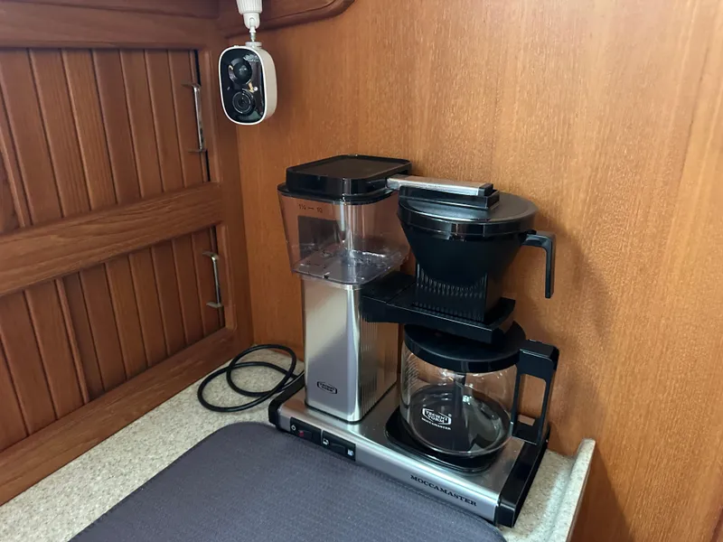 Slide: The Image of Coffee maker setup in 2006 Island Packet 485 Center Cockpit yacht kitchen. - 44