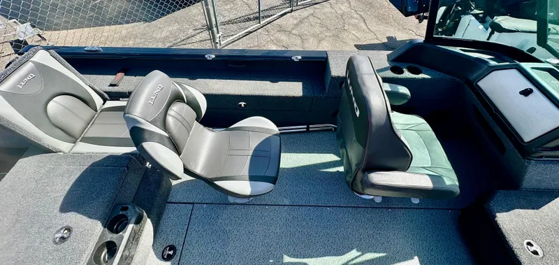 Slide: The Image of 2025 Lund 2075 IMPACT XS boat interior with seating and console, viewed from above. - 9