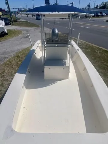 Slide: The Image of 2007 Jones Brothers 23 Bateau boat with center console, parked near a road. - 5