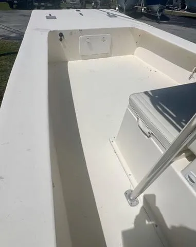 Slide: The Image of 2007 Jones Brothers 23 Bateau boat interior, featuring spacious seating and clean design. - 6