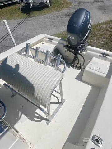 Slide: The Image of 2007 Jones Brothers 23 Bateau boat with Yamaha 115 outboard motor, featuring seating and rod holders. - 9