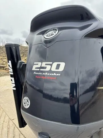 Slide: The Image of 2020 Skeeter ZX250 outboard motor, four-stroke, on a boat docked outdoors. - 5