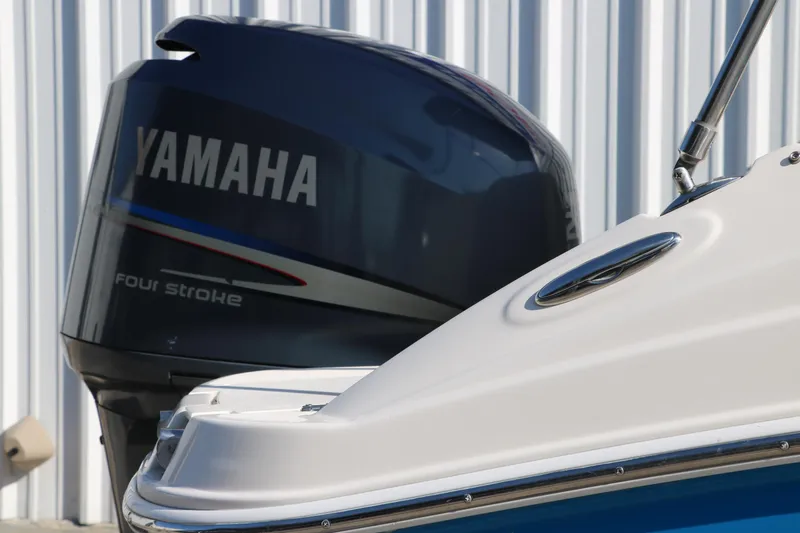 Slide: The Image of 2009 Hurricane FunDeck 226 OB boat with Yamaha four-stroke outboard motor. - 12