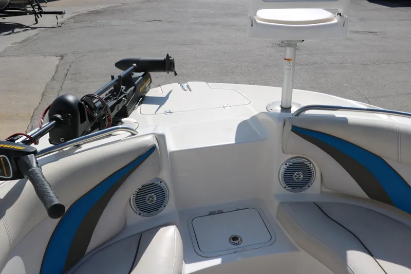 Slide: The Image of 2009 Hurricane FunDeck 226 OB boat interior with seating, speakers, and mounted equipment. - 19