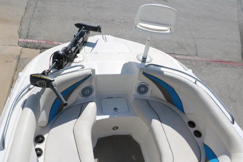 Slide: The Image of 2009 Hurricane FunDeck 226 OB boat interior with seating and mounted equipment. - 21