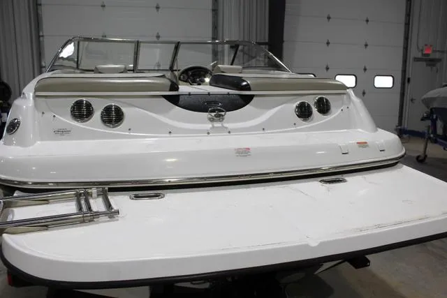 Slide: The Image of 2007 Campion Allante 545i BR boat in a garage, rear view. - 11
