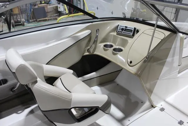 Slide: The Image of Interior of 2007 Campion Allante 545i BR boat with steering console and seating. - 17