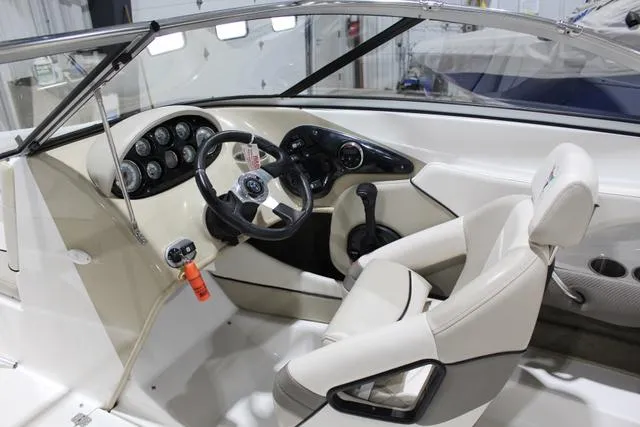 Slide: The Image of 2007 Campion Allante 545i BR boat interior with steering wheel and dashboard controls. - 18