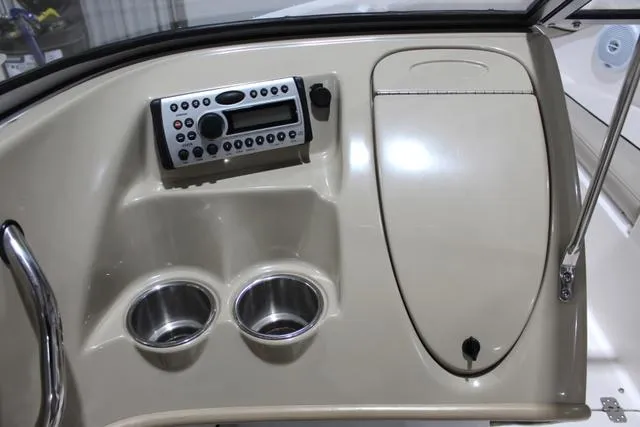 Slide: The Image of Dashboard of 2007 Campion Allante 545i BR boat with stereo and cup holders. - 19