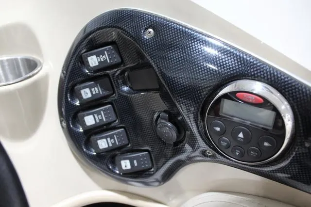 Slide: The Image of Control panel of 2007 Campion Allante 545i BR boat with switches and display. - 24