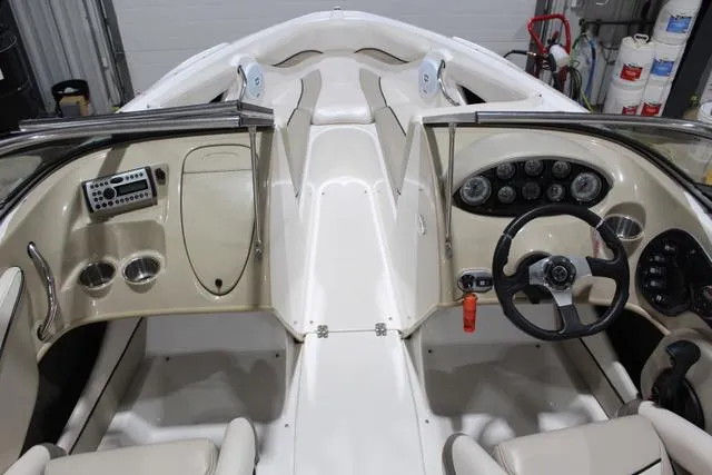 Slide: The Image of Interior of 2007 Campion Allante 545i BR boat, featuring steering wheel and dashboard controls. - 26