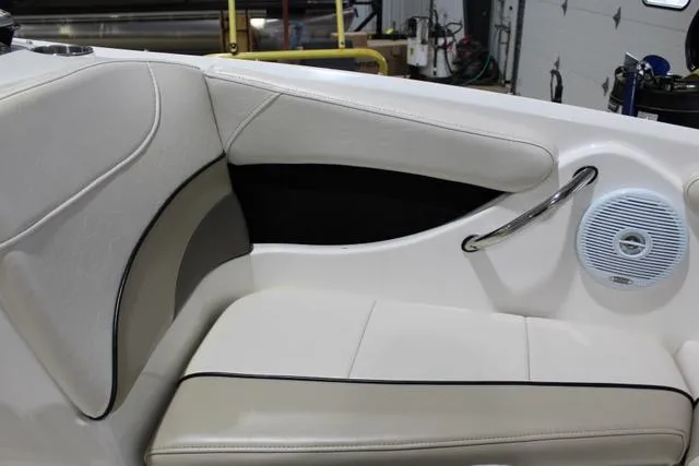 Slide: The Image of Interior seating of 2007 Campion Allante 545i BR boat with white upholstery and speaker. - 29