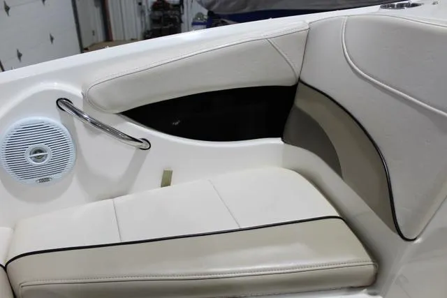 Slide: The Image of 2007 Campion Allante 545i BR boat interior with beige seating and speaker. - 30