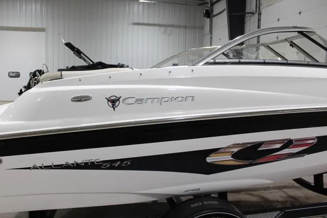 Slide: The Image of 2007 Campion Allante 545i BR boat in a garage, side view. - 5