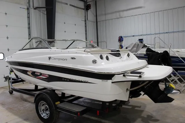 Slide: The Image of 2007 Campion Allante 545i BR boat on trailer in indoor storage. - 9