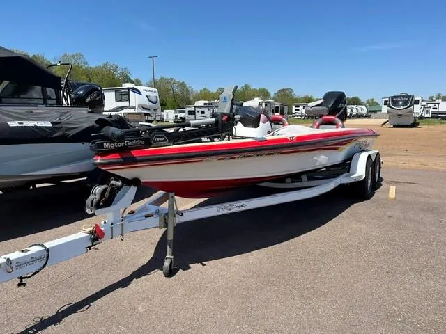 Slide: The Image of 2007 ProCraft 210 Super Pro SC boat on trailer in parking lot. - 1