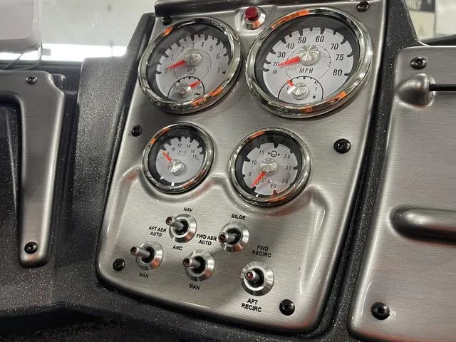 Slide: The Image of Dashboard of 2025 Tracker Pro Guide™ V-175 Combo with gauges and control switches. - 22