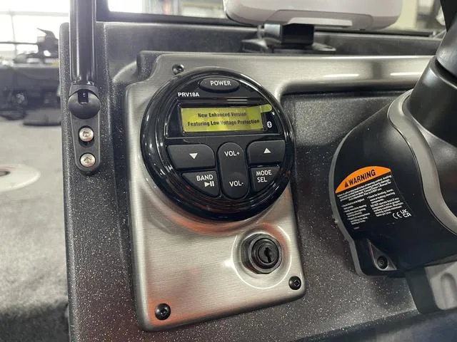 Slide: The Image of Control panel of 2025 Tracker Pro Guide™ V-175 Combo boat with audio system. - 23