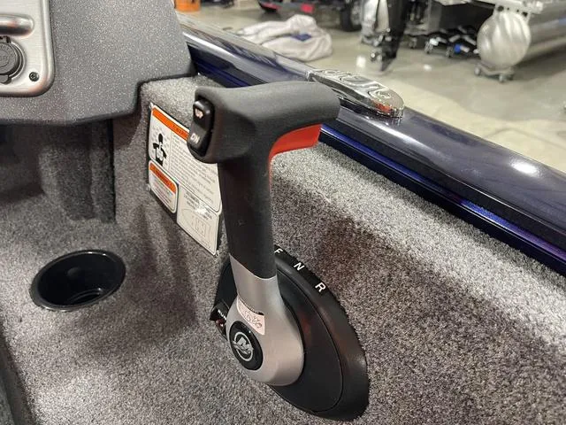 Slide: The Image of Throttle control of 2025 Tracker Pro Guide™ V-175 Combo boat, featuring ergonomic design. - 25