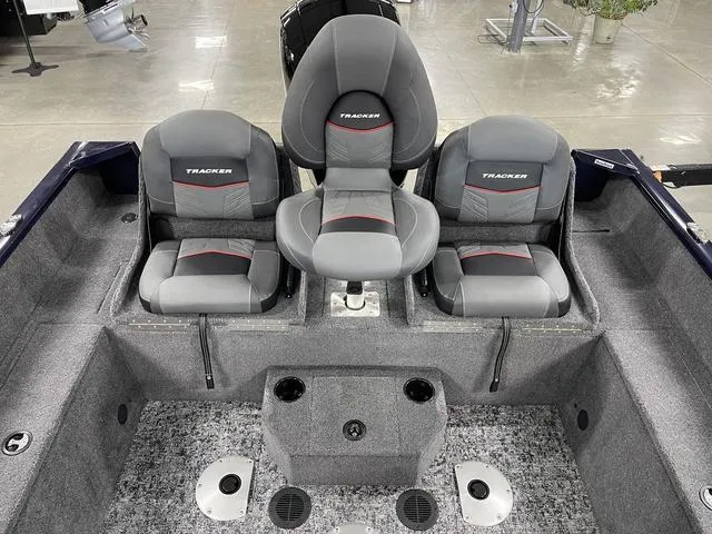 Slide: The Image of 2025 Tracker Pro Guide™ V-175 Combo boat interior with three cushioned seats. - 28